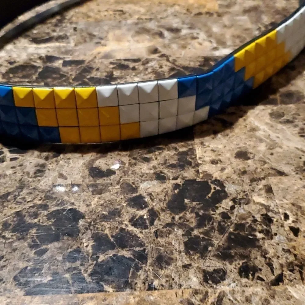 1.5 inch pyramid studded belt -blue, white, yellow on black